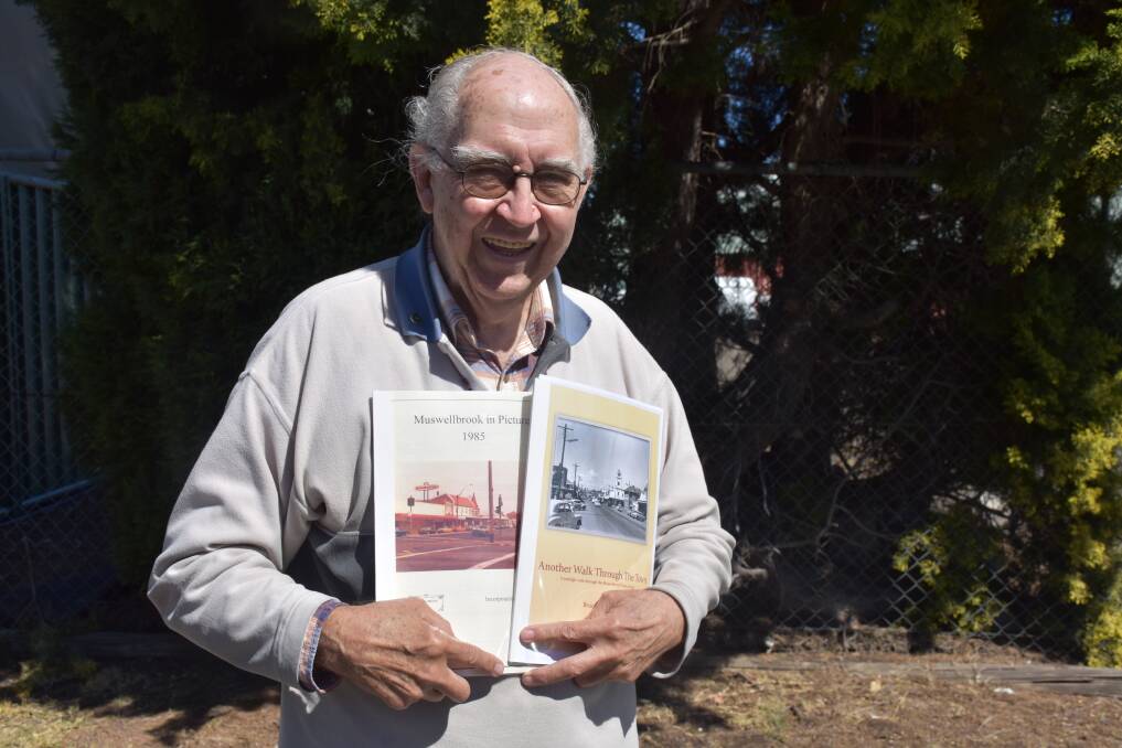HISTORIAN: Muswellbrook's Bruce James with the books to be launched on Saturday.