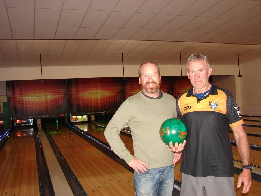 ROCK N BOWL: Muswellbrook mayor Martin Rush and rival Tim 'The Killer" Kane at the first Great Balls of Fire fundraiser. The current total raised is $870 out of a desired $1000. Picture: Tony McTaggart.