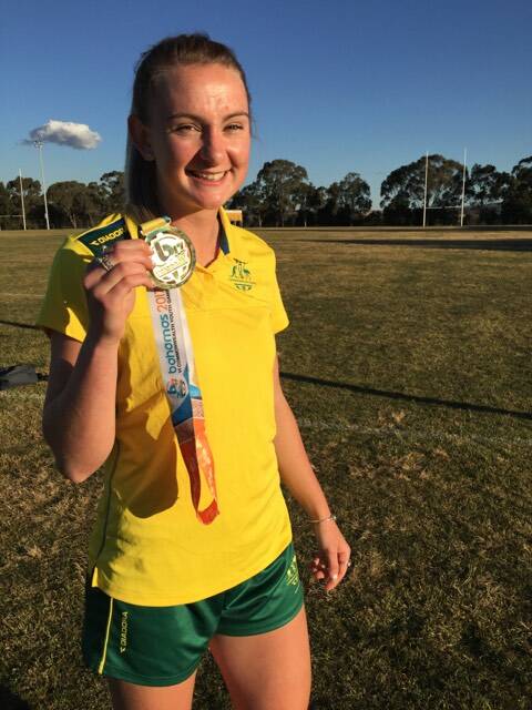 GOLDEN ACHIEVEMENT: Muswellbrook High School's Brydie Parker with her 2017 Youth Commonwealth Games gold medal.