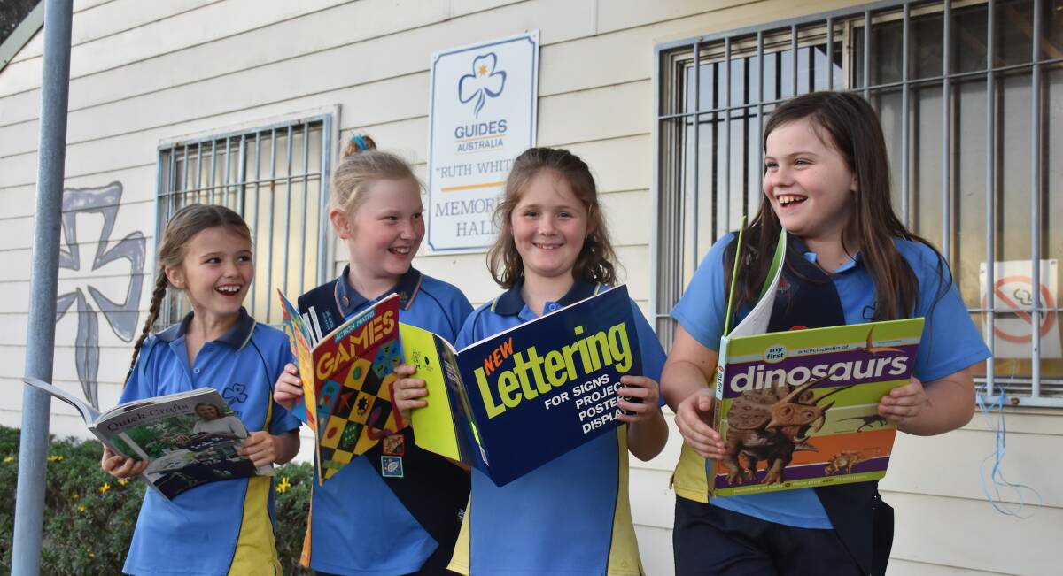 BOOKS ARE FUN: Muswellbrook Girl Guides members Chelsea Oatley, Samantha hocking, Joan Rafferty, Georgia Kelly are looking forward to the upcoming event.