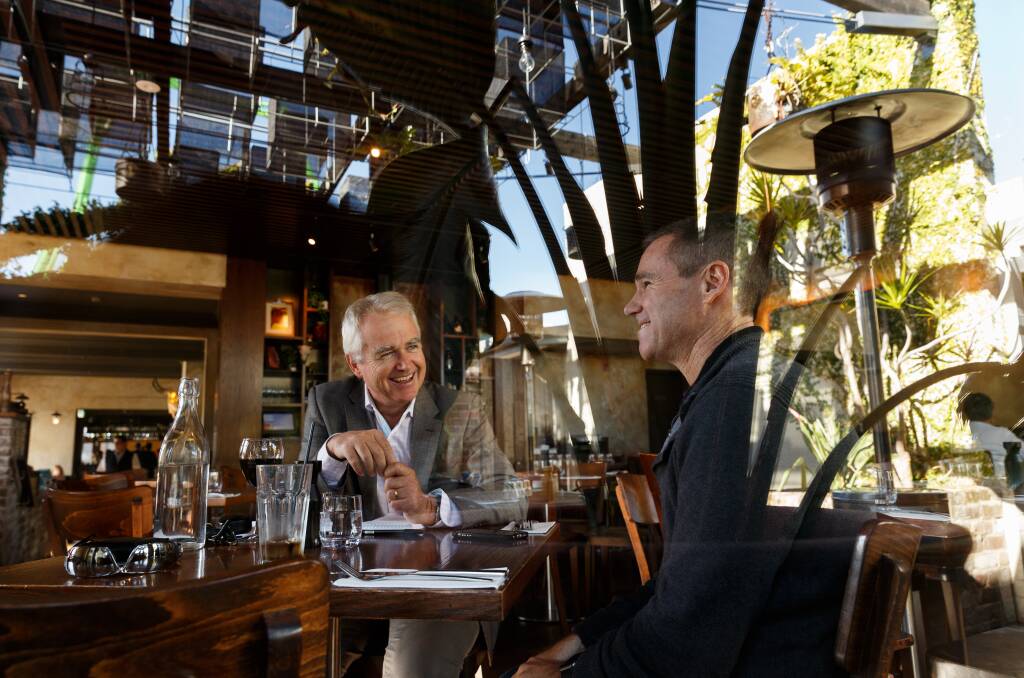 Matt Hall, right, at lunch with Scott Bevan at The Burwood Inn, Merewether, talks about his flying career. Picture: Max Mason-Hubers