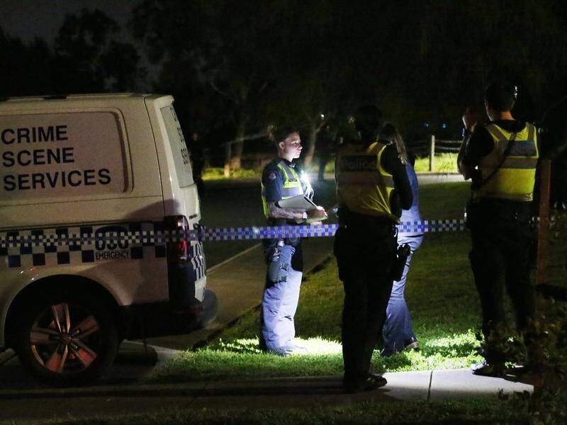 A woman's body was found in parkland in Melbourne's northwest, and police descended on the scene.