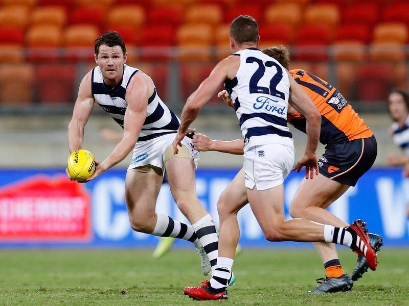 Patrick Dangerfield (L) says virus restrictions make the 2020 AFL campaign a "war of attrition".