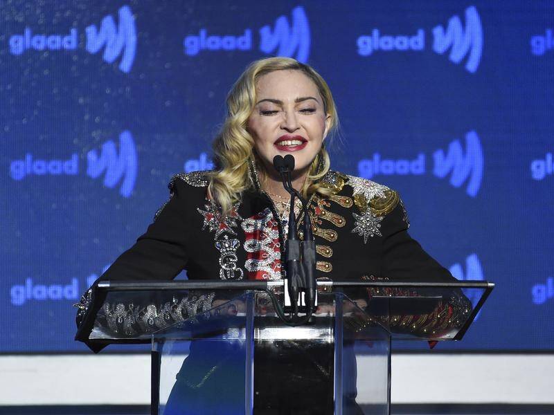 Madonna says she will "never stop playing music to suit someone's political agenda".
