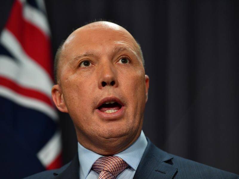 Peter Dutton won't save three journalists from possible criminal charges over stories they reported.