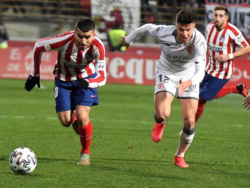 Angel Corre(L) scored for Atletico Madrid before Cultural Leonesa delivered two late goals.