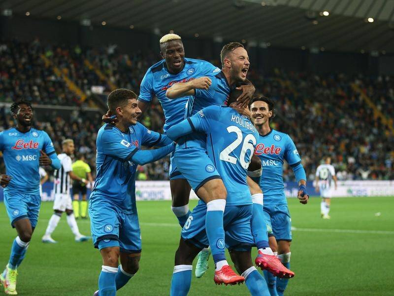 Napoli lead Serie A after winning won 4-0 at Udinese.