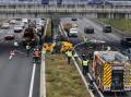 A helicopter has crashed on the M-40 Highway in Madrid, injuring three people. (EPA PHOTO)