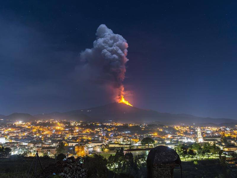 Flames have been seen erupting from a crater on the Mount Etna volcano.