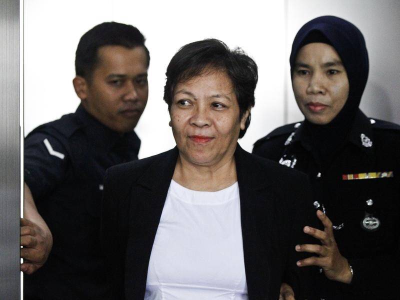 Australian Maria Exposto, centre, has been acquitted in Malaysia of drug trafficking.