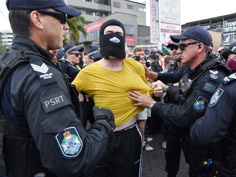 Six protesters have been arrested during a rally outside the Kangaroo Point Hotel in Brisbane.