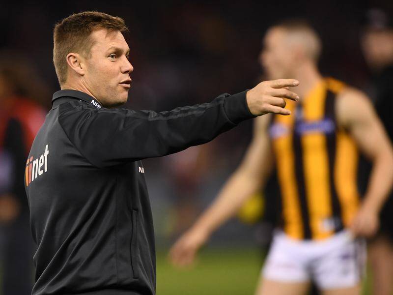 Sam Mitchell has rubbished talk that he wants to take the Hawthorn coaching reins early.