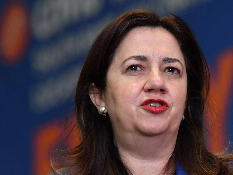 Annastacia Palaszczuk says Qld's system is under pressure from visitors and Afghanistan evacuees.