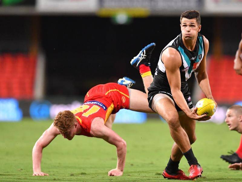 Port Adelaide's Ryan Burton is firming as a likely inclusion for their AFL final against Geelong.