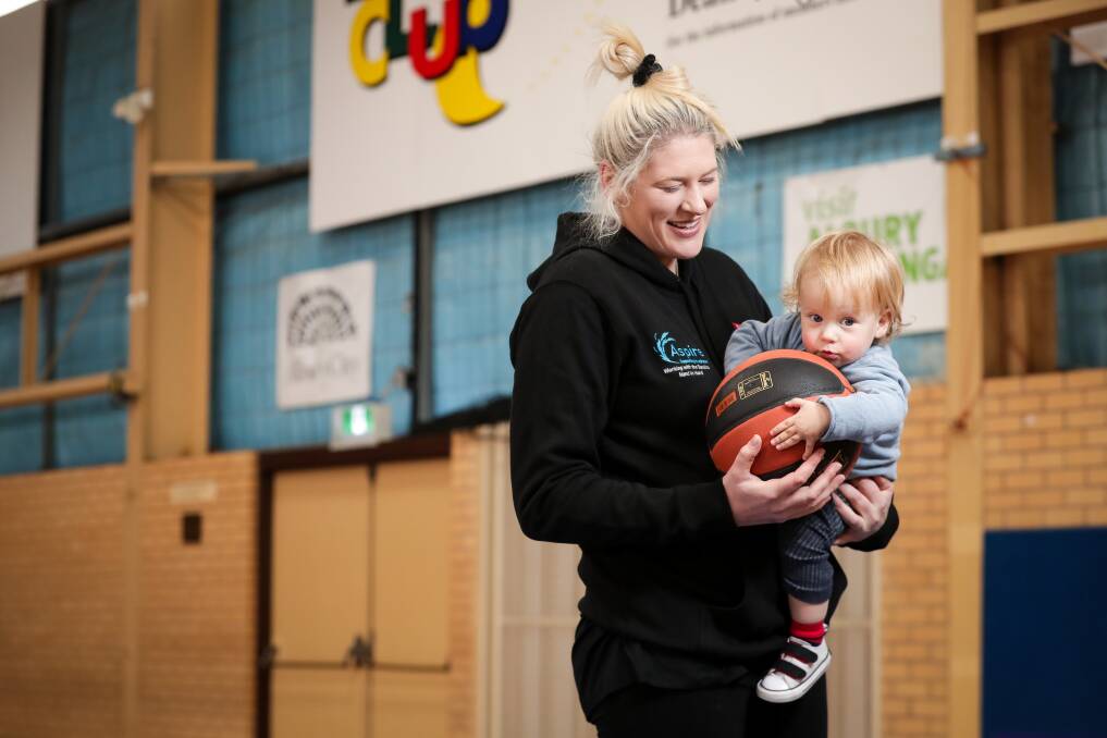LIFE AFTER SPORT: Lauren Jackson and son Harry. The basketball great shared her experience of anxiety and depression at the 2020 virtual Winter Solstice. 