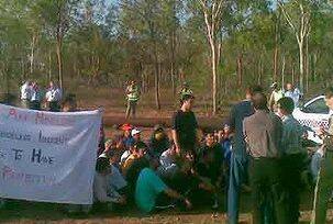 The escaped Afghan detainees stage a protest on the side of the Stuart Highway. Photo: Glenn Campbell