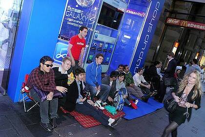 People waiting outside Samsung's store on Monday.