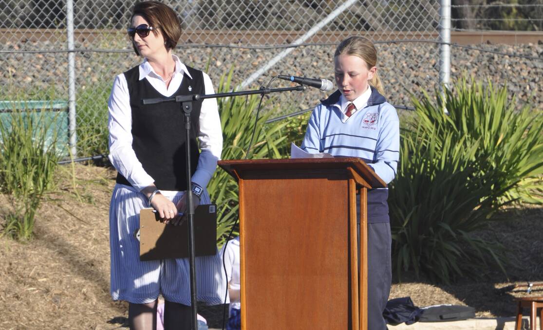 LASTING LEGACY: St James’ Primary School student Caitlin Byron gave a reading.