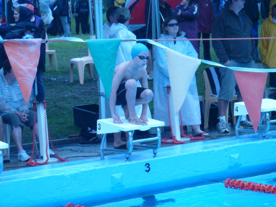 THIRD: Muswellbrook’s Hayden Bull prepares for the 200m medley relay.