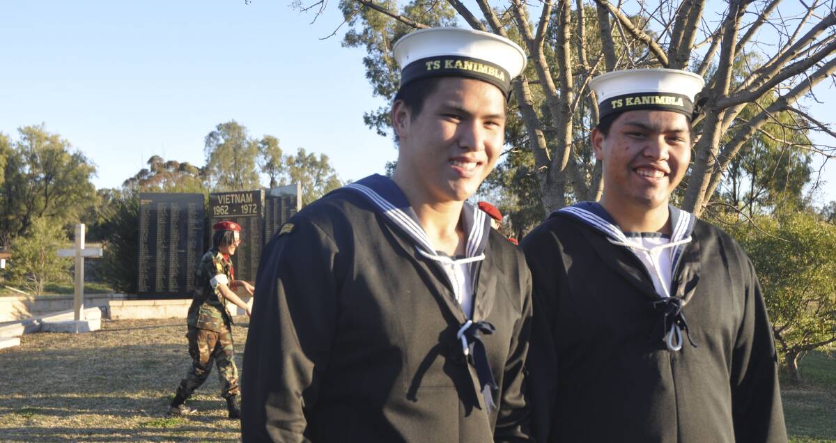 TRIBUTE TIME: Cadets Abel Nguyen and Richard Nguyen from the Australian Navy cadet unit TS Kanimbla travelled from Sydney to participate in the event.